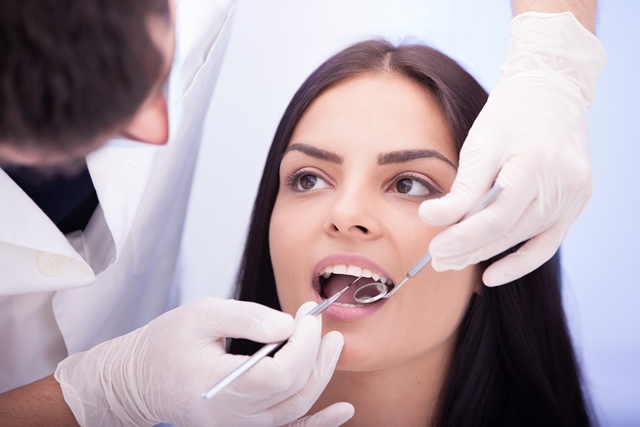 Female patient undergoing preventive dental care