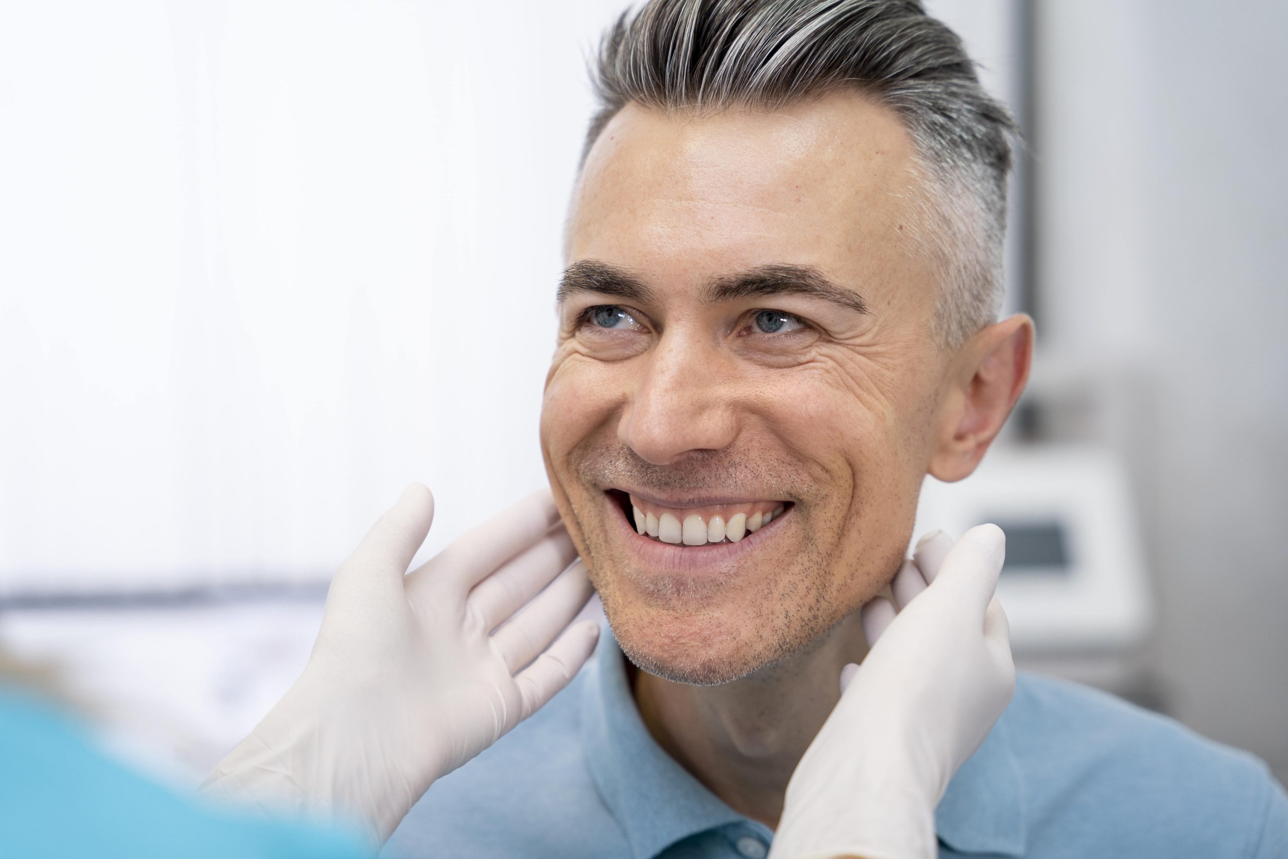 dentist checking dental implants